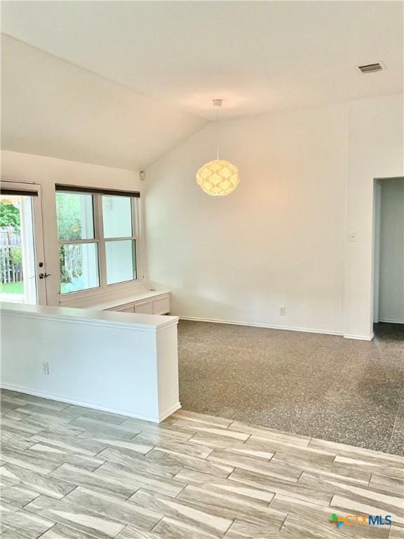 9100 Brimstone Ln, Austin, TX 78717 - unfurnished room with lofted ceiling and baseboards