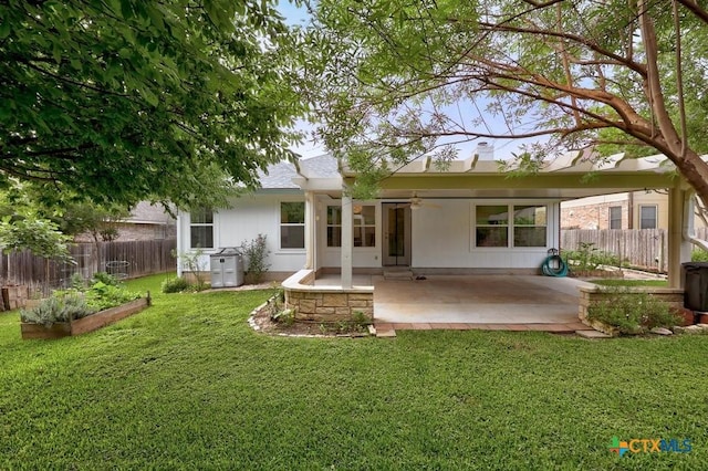 9100 Brimstone Ln, Austin, TX 78717 - rear view of property with a patio area, a ceiling fan, and a garden