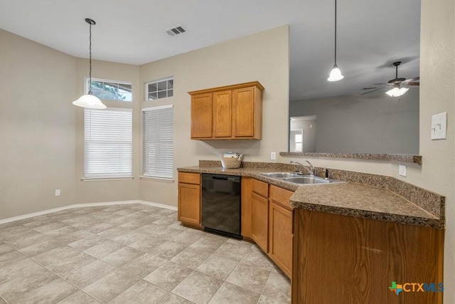1117 Branchwood Way, Temple, TX 76502 - kitchen featuring black dishwasher, brown cabinets, decorative light fixtures, and dark countertops