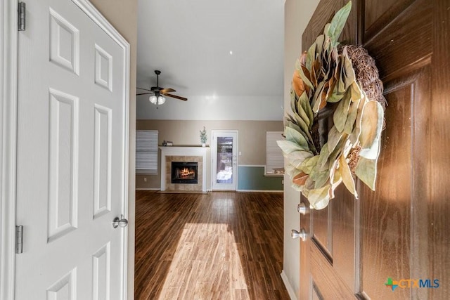 1117 Branchwood Way, Temple, TX 76502 - unfurnished living room with wood finished floors, ceiling fan, and a fireplace