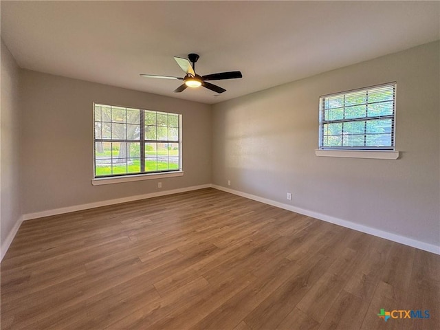 4310 Antelope Trl, Temple, TX 76504 - spare room featuring plenty of natural light, wood finished floors, and a ceiling fan