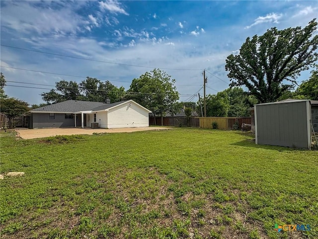 4310 Antelope Trl, Temple, TX 76504 - fenced backyard with a storage shed and a patio area