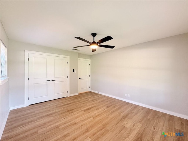 4310 Antelope Trl, Temple, TX 76504 - unfurnished bedroom featuring light wood-style flooring, a closet, and a ceiling fan