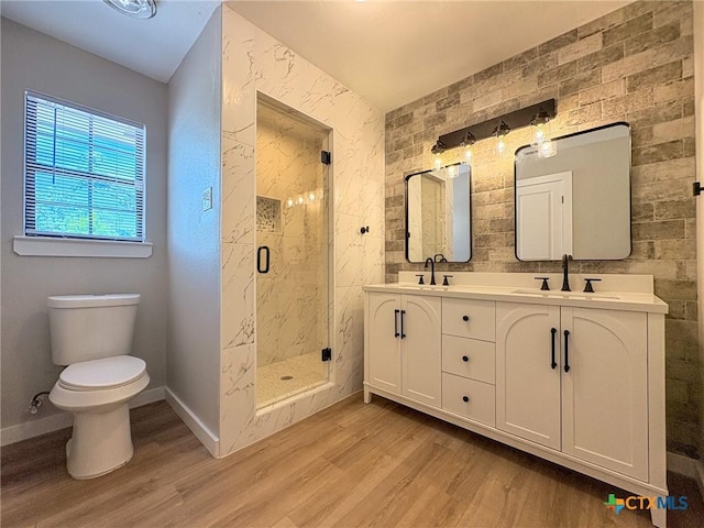 4310 Antelope Trl, Temple, TX 76504 - bathroom with wood finished floors, a shower stall, and double vanity