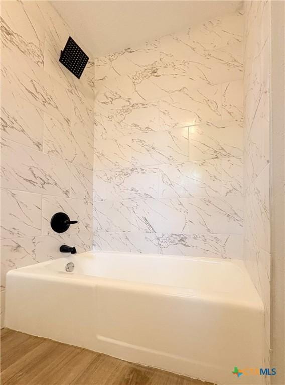 4310 Antelope Trl, Temple, TX 76504 - bathroom with wood finished floors and shower / bath combination