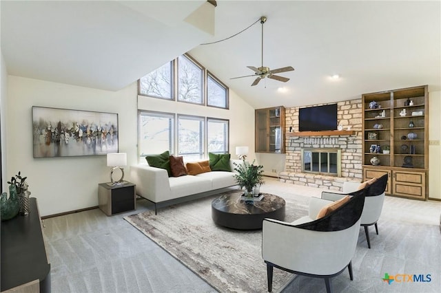 living room featuring carpet floors, a brick fireplace, high vaulted ceiling, and baseboards