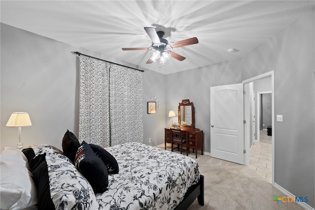 721 Gallagher Dr, Canyon Lake, TX 78133 - carpeted bedroom featuring a ceiling fan and baseboards