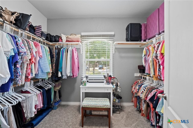 721 Gallagher Dr, Canyon Lake, TX 78133 - walk in closet featuring carpet flooring