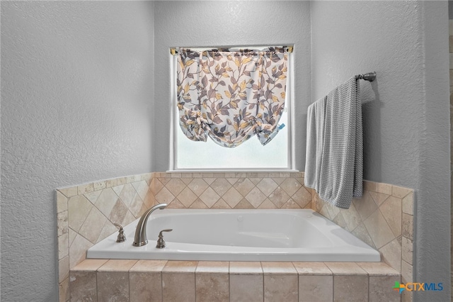 721 Gallagher Dr, Canyon Lake, TX 78133 - full bath featuring a textured wall and a bath