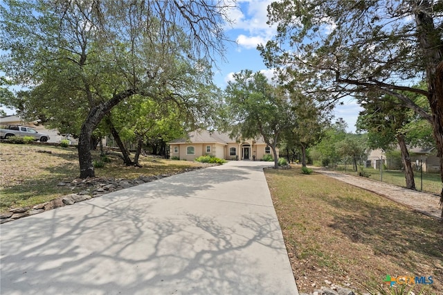 721 Gallagher Dr, Canyon Lake, TX 78133 - view of front of house featuring concrete driveway