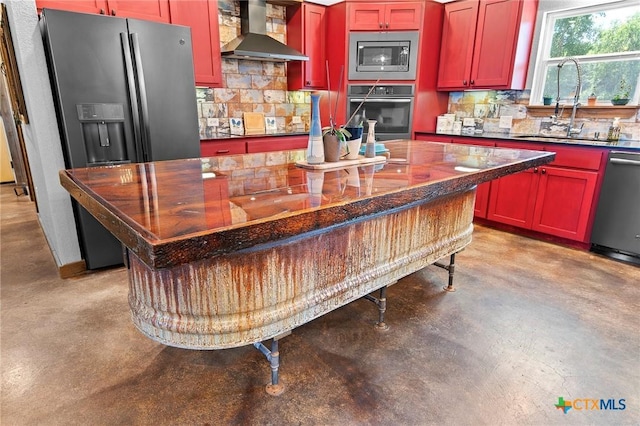 463 County Road 436, Thorndale, TX 76577 - kitchen with wall chimney exhaust hood, stainless steel appliances, a sink, concrete flooring, and backsplash