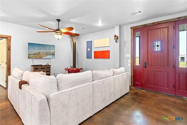 living room with ceiling fan