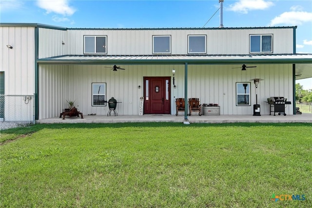 463 County Road 436, Thorndale, TX 76577 - view of front facade with ceiling fan, a front lawn, and a patio