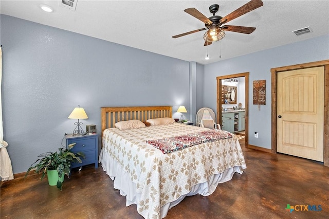 463 County Road 436, Thorndale, TX 76577 - bedroom featuring concrete flooring, baseboards, a ceiling fan, and connected bathroom