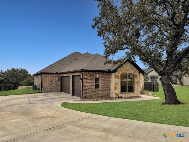 exterior space featuring a yard and a garage