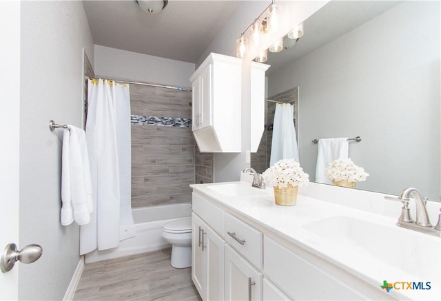 2109 Mercer St, Nolanville, TX 76559 - bathroom with double vanity, toilet, shower / tub combo, and a sink