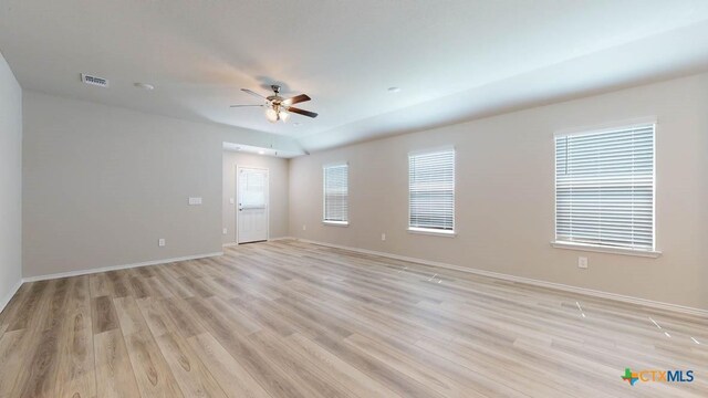 unfurnished room with ceiling fan and light hardwood / wood-style floors