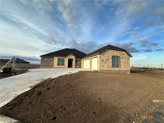 view of front of home featuring a garage