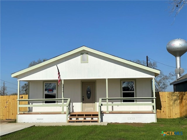 view of front of home with a front lawn and a porch