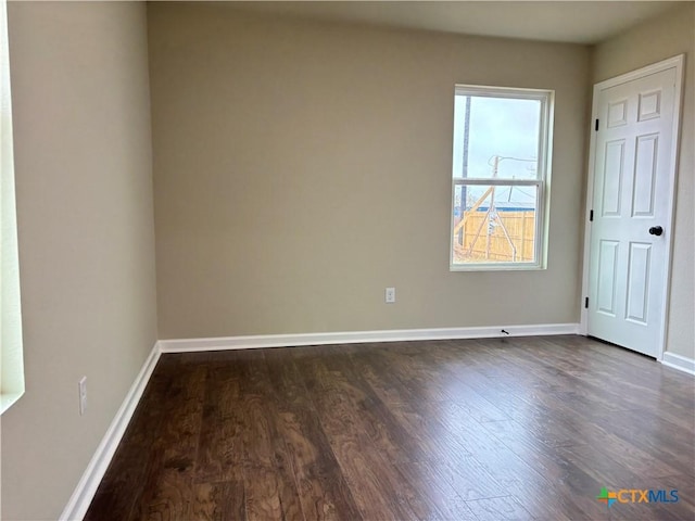 interior space with dark hardwood / wood-style floors