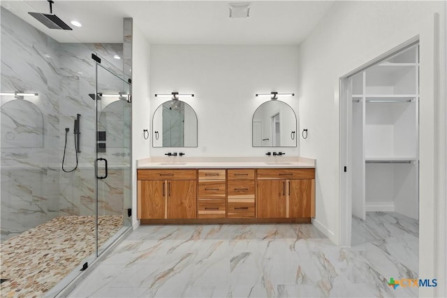 bathroom featuring vanity and walk in shower