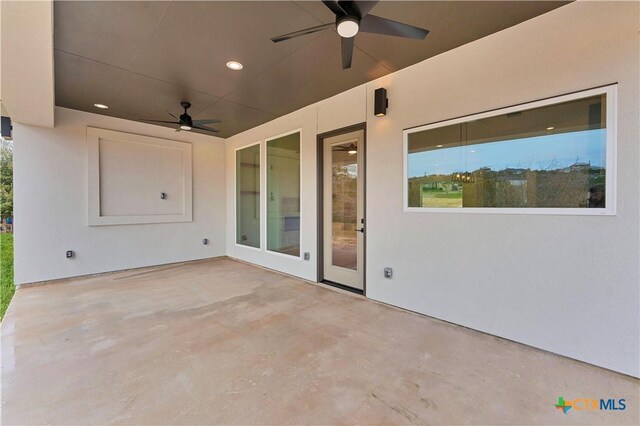 view of patio / terrace with ceiling fan