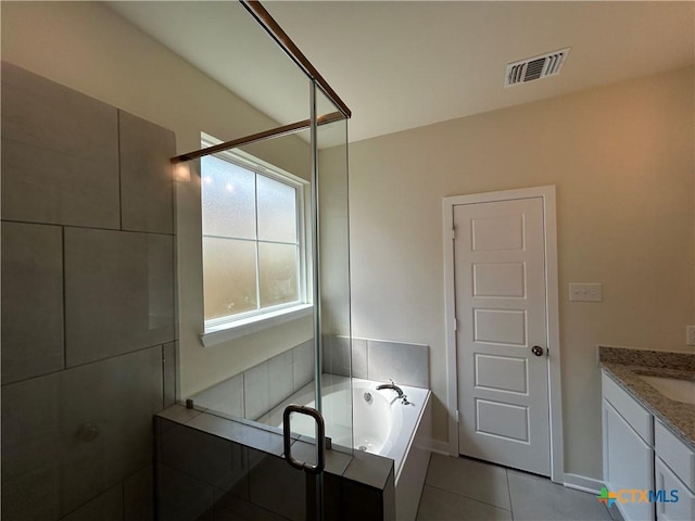 250 Wind Ridge Dr, Copperas Cove, TX 76522 - bathroom featuring a shower stall, a bath, vanity, tile patterned flooring, and visible vents