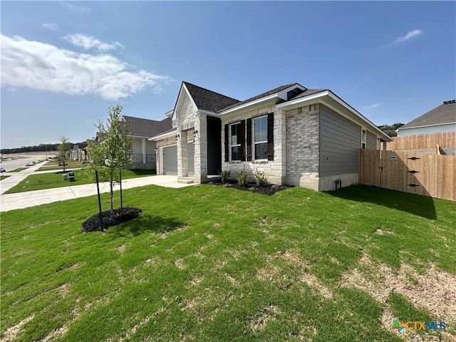 250 Wind Ridge Dr, Copperas Cove, TX 76522 - view of front of property featuring a front yard, a garage, fence, a gate, and driveway