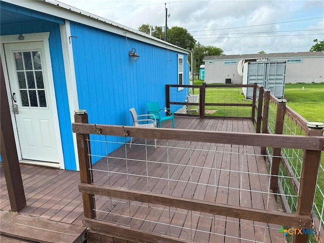 1008 W Dallas Ave, Seadrift, TX 77983 - wooden terrace featuring a lawn