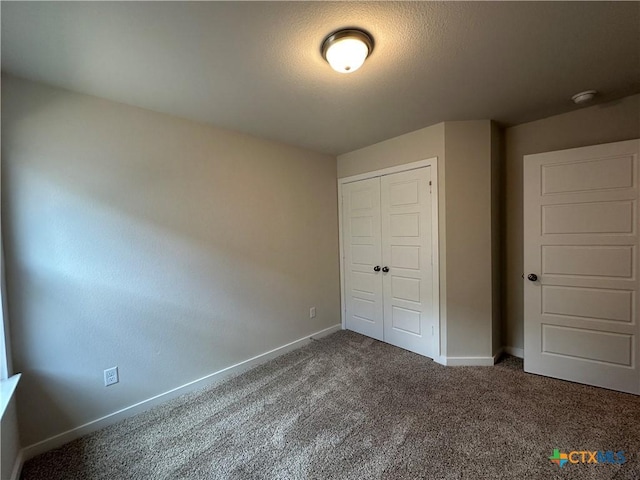 907 James Parker Cir, Killeen, TX 76542 - unfurnished bedroom with a closet and carpet flooring
