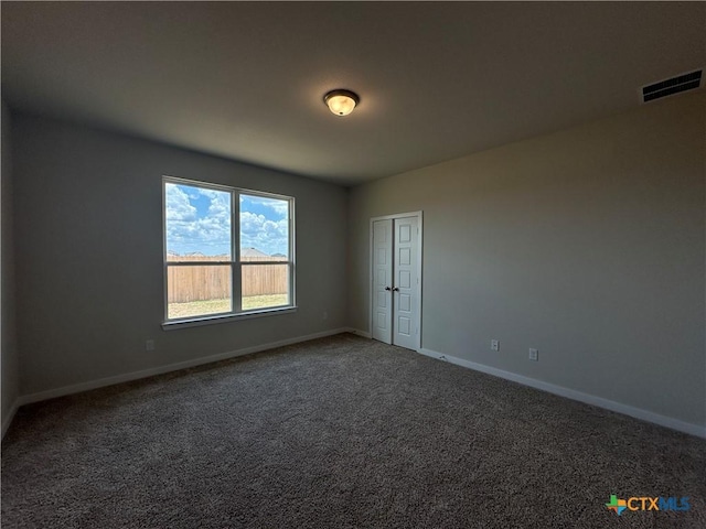 907 James Parker Cir, Killeen, TX 76542 - empty room with baseboards and carpet floors