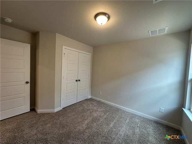 907 James Parker Cir, Killeen, TX 76542 - unfurnished bedroom with carpet and a closet