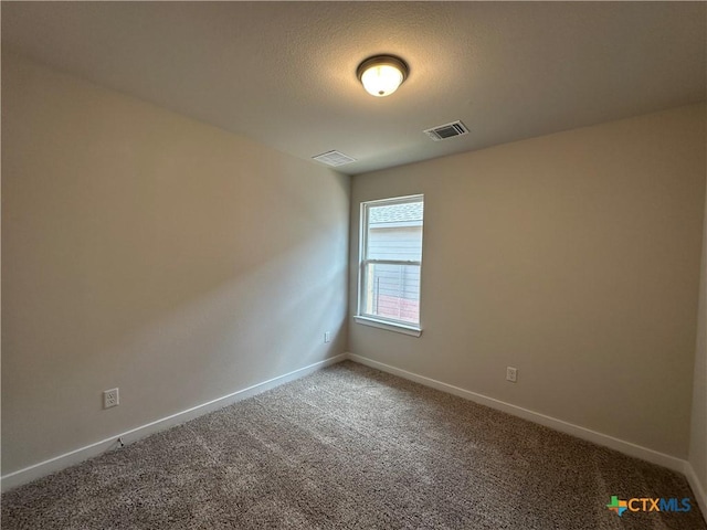907 James Parker Cir, Killeen, TX 76542 - empty room with carpet floors and a textured ceiling