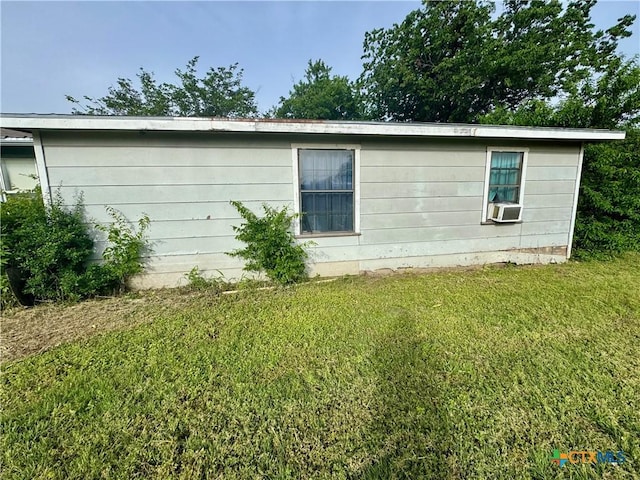 235 Murray Ln, Gatesville, TX 76528 - view of property exterior featuring a lawn and cooling unit