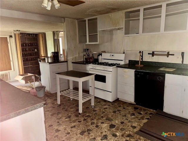 235 Murray Ln, Gatesville, TX 76528 - kitchen featuring white range with gas stovetop, black dishwasher, white cabinets, dark countertops, and a textured ceiling