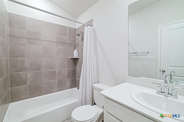 full bathroom with toilet, shower / bath combination with curtain, lofted ceiling, and vanity