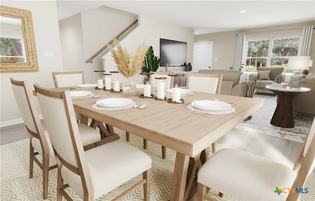 dining room with light hardwood / wood-style floors