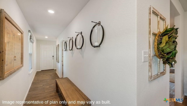 hall with recessed lighting, wood finished floors, and baseboards