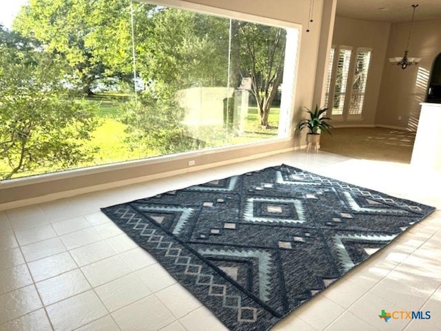 2772 Cloisters Dr, College Station, TX 77845 - tiled empty room with a chandelier