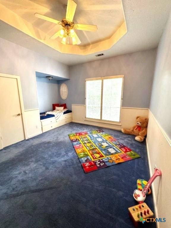 2772 Cloisters Dr, College Station, TX 77845 - rec room with a raised ceiling, carpet flooring, and ceiling fan