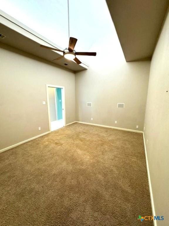 2772 Cloisters Dr, College Station, TX 77845 - carpeted empty room with a ceiling fan and baseboards
