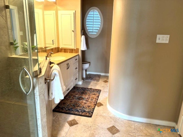 2772 Cloisters Dr, College Station, TX 77845 - full bathroom featuring vanity, a tile shower, and tile patterned floors