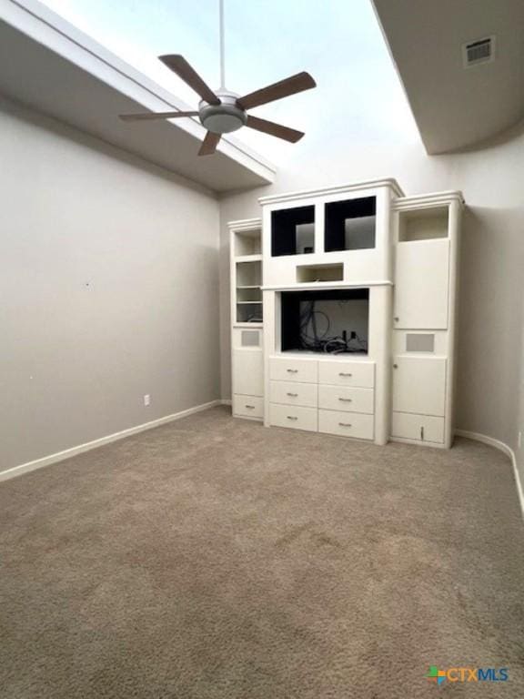 2772 Cloisters Dr, College Station, TX 77845 - unfurnished living room featuring carpet, ceiling fan, and vaulted ceiling