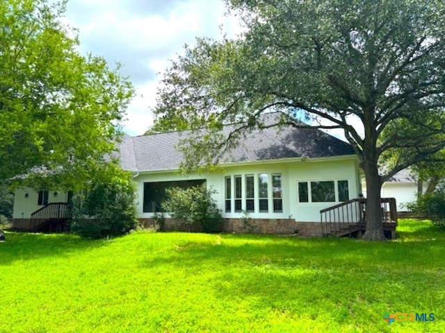 2772 Cloisters Dr, College Station, TX 77845 - back of house featuring a lawn and a shingled roof