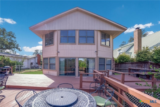 323 E Klein Rd, New Braunfels, TX 78130 - rear view of property with a wooden deck