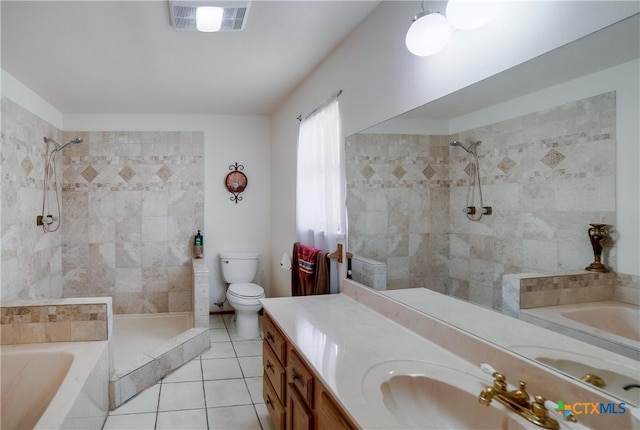 323 E Klein Rd, New Braunfels, TX 78130 - full bathroom with tile patterned flooring, vanity, toilet, and shower with separate bathtub