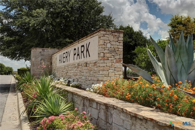 view of community sign