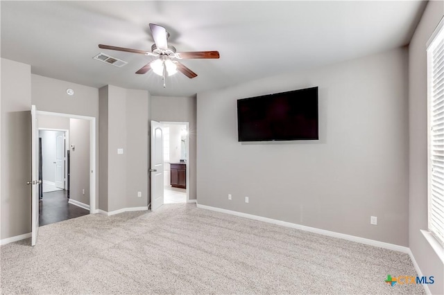 1202 Jester Ct, Copperas Cove, TX 76522 - unfurnished bedroom with carpet floors, ensuite bathroom, and a ceiling fan