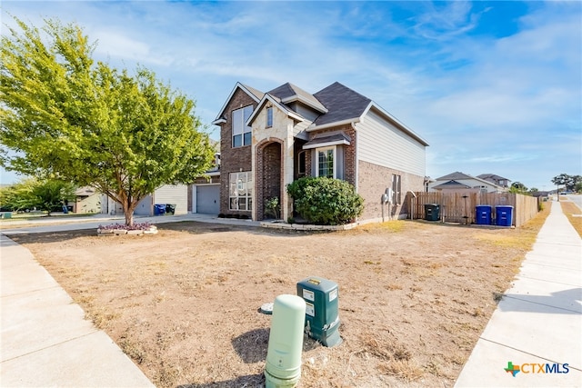 view of front of property featuring a garage