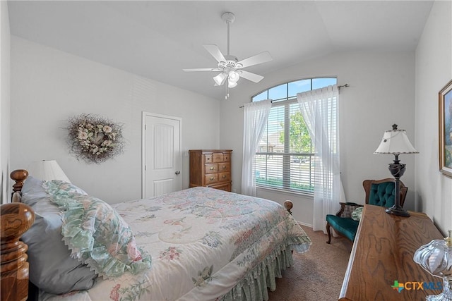 carpeted bedroom with vaulted ceiling and ceiling fan